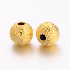 dekorativne perle 6 mm, zlate b. brez niklja, 1 kos