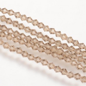 steklene perle - bikoni 3x3 mm, luknja 0,5mm, burlywood b., 1 niz - cca 130 kos